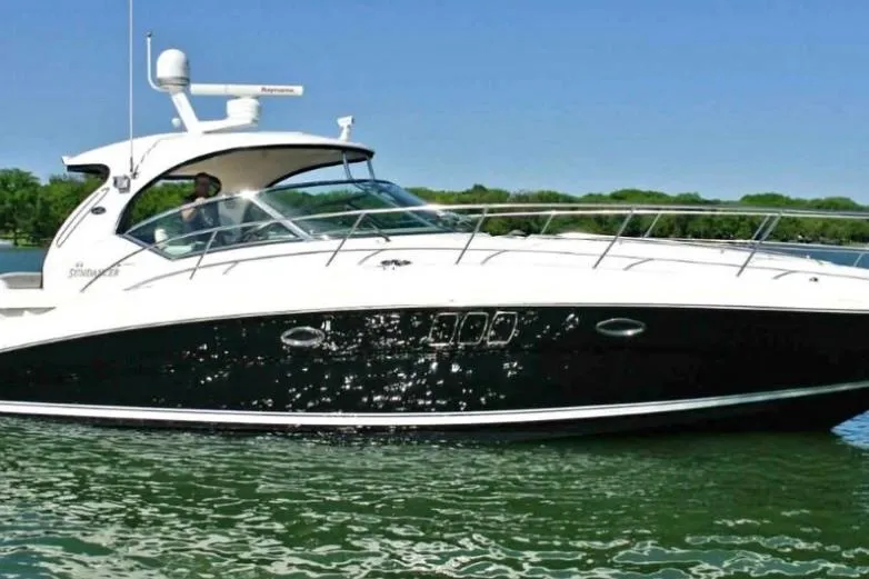 Slide: The Image of 2007 Sea Ray 440 Sundancer yacht cruising on a sunny day. - 0