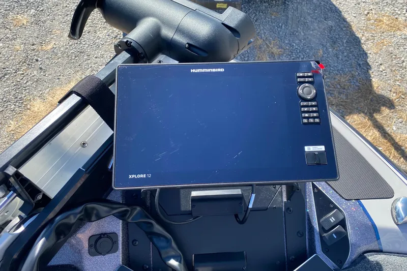 Slide: The Image of 2026 Skeeter FXR21 FLEX boat with Humminbird Xplore 12 navigation system. - 12