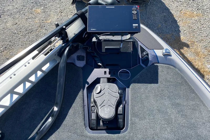 Slide: The Image of 2026 Skeeter FXR21 FLEX boat deck with control panel and navigation screen. - 15