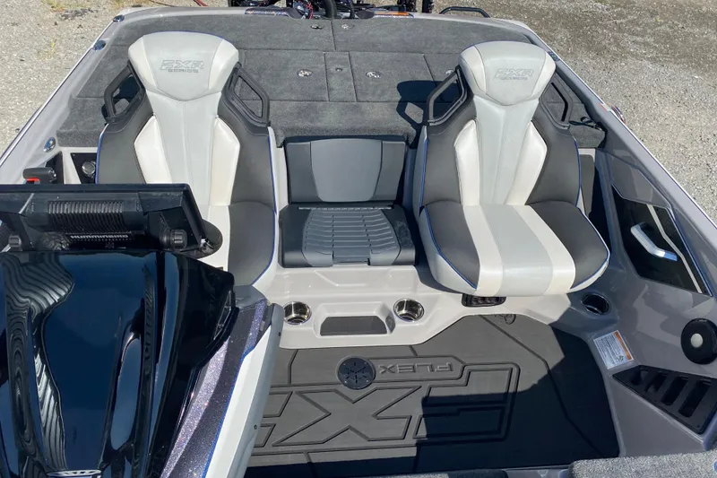 Slide: The Image of 2026 Skeeter FXR21 FLEX boat interior with dual seats and modern design. - 21