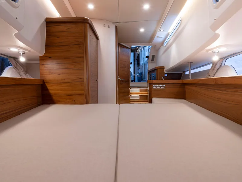 Slide: The Image of Luxurious interior of 2026 Nimbus Commuter 11 with wooden finishes and modern lighting. - 17