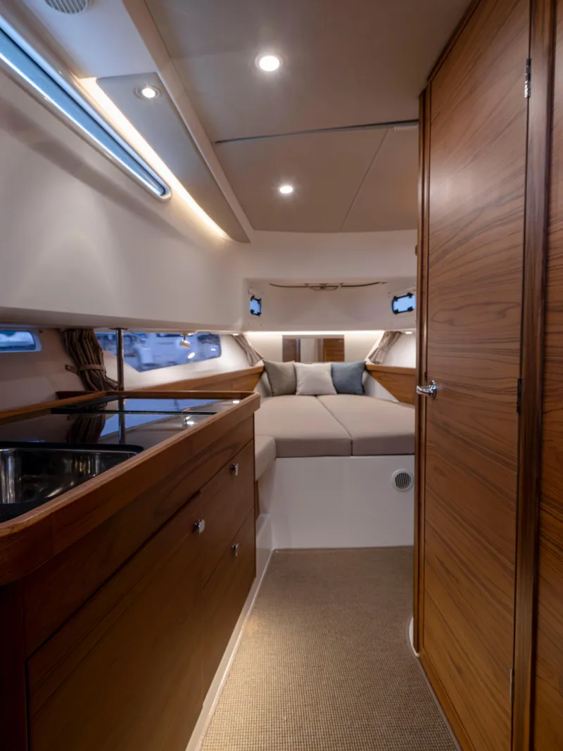 Slide: The Image of Luxurious interior of 2026 Nimbus Commuter 11 yacht with cozy seating and modern amenities. - 48