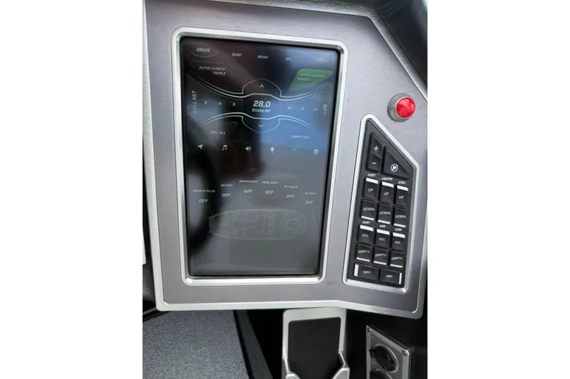 Slide: The Image of 2018 MasterCraft XT25 dashboard with touchscreen controls and navigation buttons. - 10