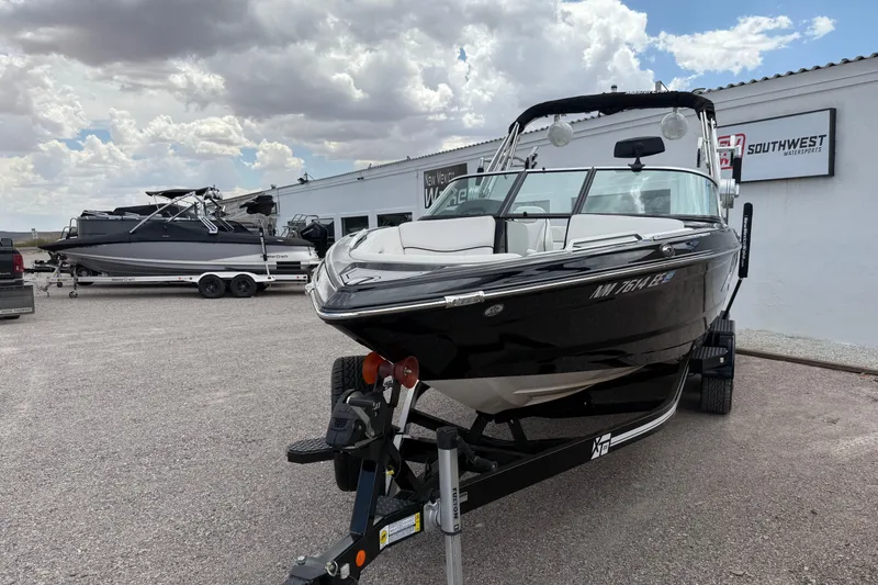 Slide: The Image of 2018 MasterCraft XT25 boat on trailer at Southwest Watersports dealership. - 3