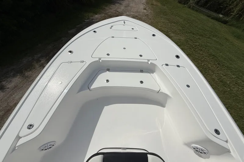 Slide: The Image of 2026 Tidewater 2410 Bay Max boat deck with storage compartments, viewed from above. - 15