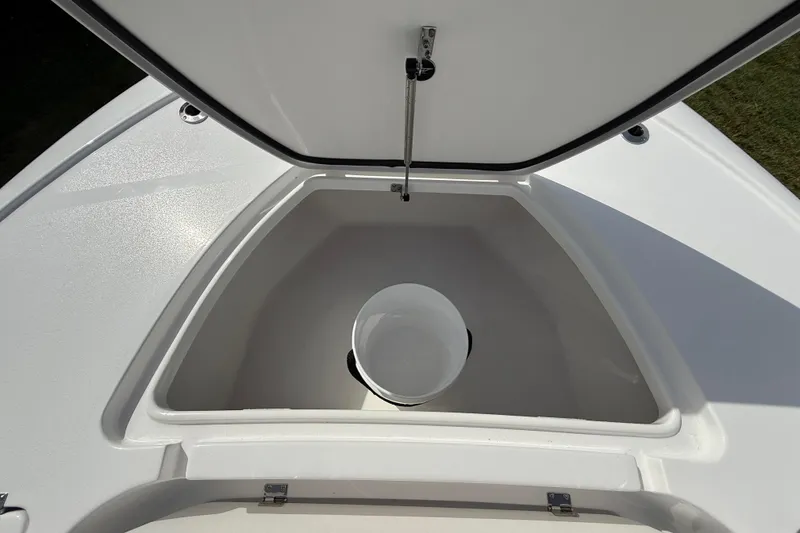 Slide: The Image of Open storage compartment on 2026 Tidewater 2410 Bay Max boat with bucket inside. - 37