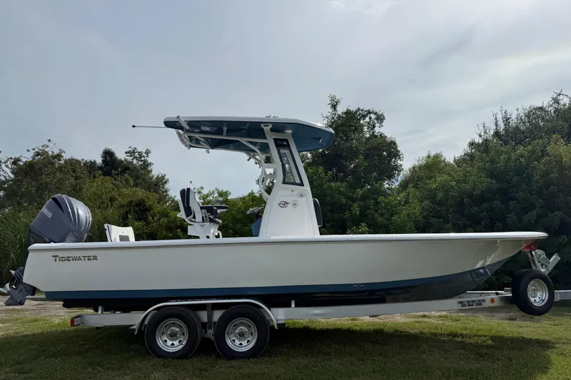 Slide: The Image of 2026 Tidewater 2410 Bay Max boat on trailer, side view, outdoors. - 7