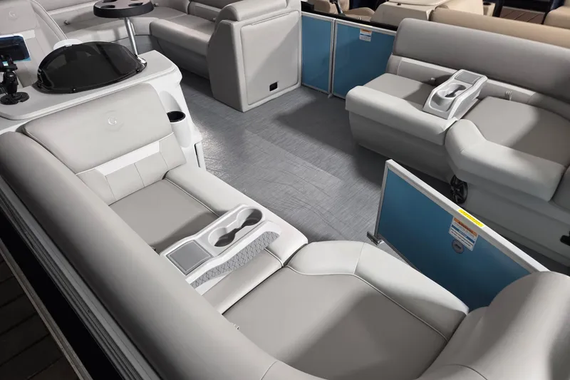 Slide: The Image of 2026 Godfrey Experience 2086 BFX pontoon boat interior with plush seating and cup holders. - 5