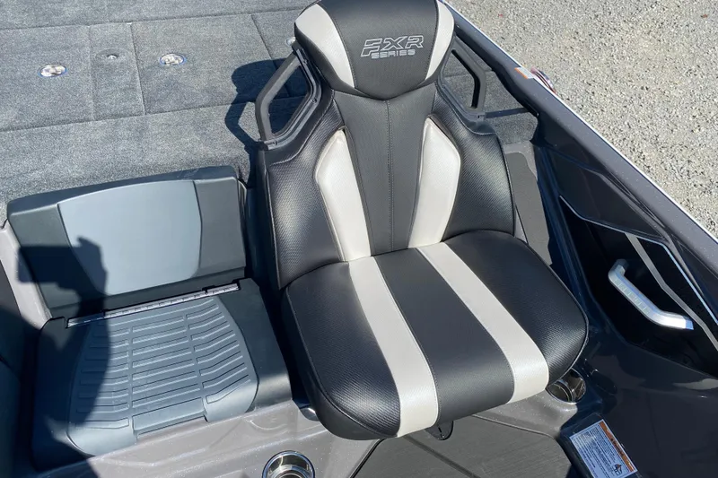 Slide: The Image of 2026 Skeeter FXR21 FLEX boat seat with black and white design, featuring FXR Series branding. - 15