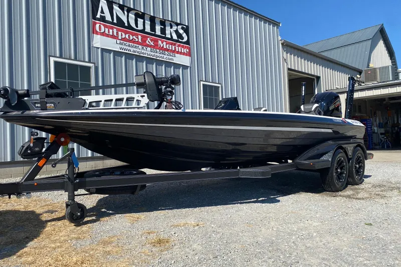 Slide: The Image of 2026 Skeeter FXR21 FLEX boat on trailer at Anglers Outpost & Marine. - 4