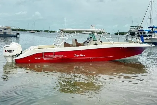 The Image of 2011 Hydra-Sports 4200 SF boat with Yamaha engines, docked in a marina. - 0