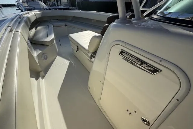 Slide: The Image of 2011 Hydra-Sports 4200 SF boat interior with seating and storage. - 6