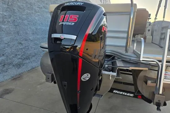 Slide: The Image of 2022 Lowe SS210 boat with Mercury 115 Pro XS outboard motor, docked outdoors. - 14