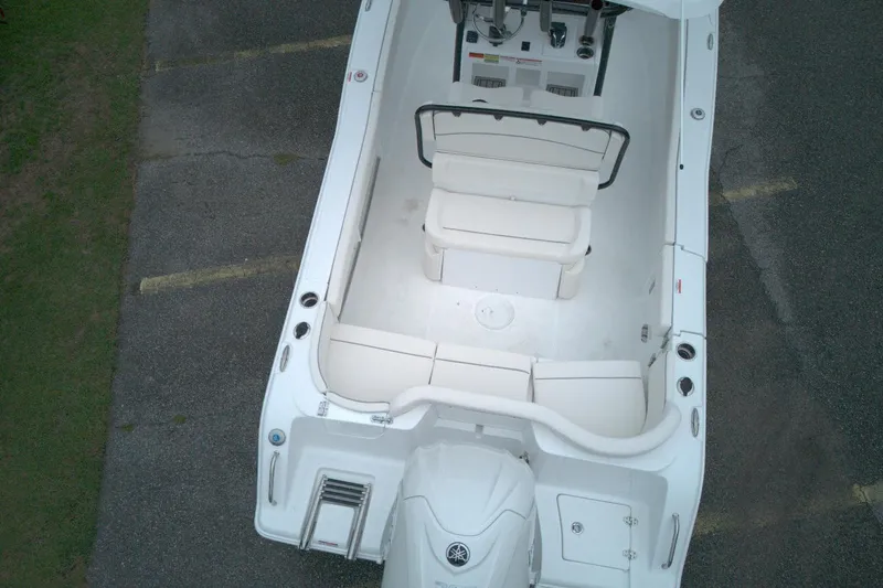 Slide: The Image of Overhead view of 2026 Seahunt 245 boat interior with seating and controls. - 12