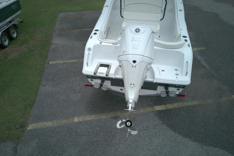 Slide: The Image of Aerial view of 2026 Seahunt 245 boat with powerful outboard motor. - 13