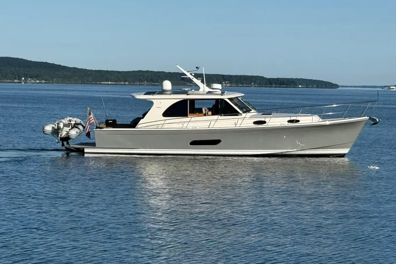 The Image of 2017 Grand Banks 44 Eastbay SX yacht cruising on calm waters. - 0