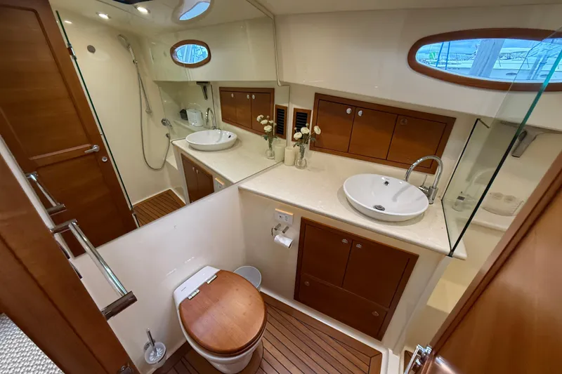 Slide: The Image of Luxurious bathroom interior of 2017 Grand Banks 44 Eastbay SX yacht with elegant sink. - 100