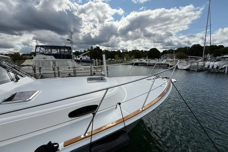 Slide: The Image of Bow of 2017 Grand Banks 44 Eastbay SX with anchor chain and winch. - 22