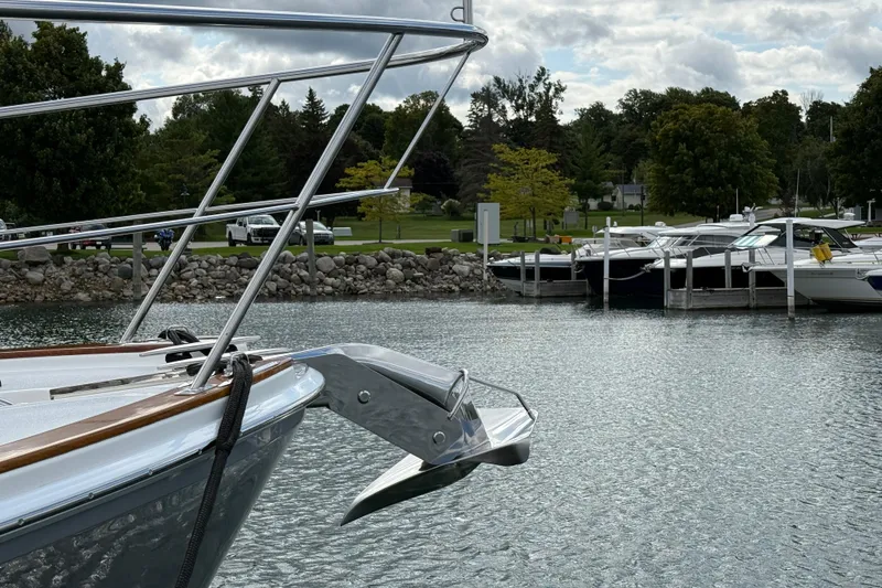 Slide: The Image of 2017 Grand Banks 44 Eastbay SX docked at a marina under cloudy skies. - 26