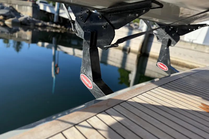 Slide: The Image of Luxurious 2017 Grand Banks 44 Eastbay SX yacht interior with elegant seating and wooden table. - 49