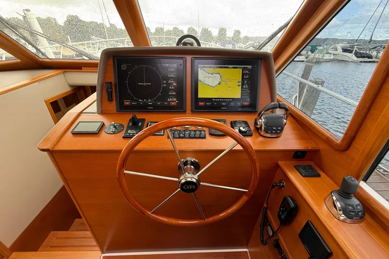 Slide: The Image of Interior of 2017 Grand Banks 44 Eastbay SX yacht with wooden flooring and cozy seating. - 79