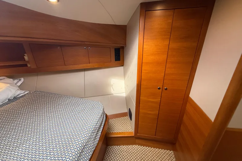 Slide: The Image of Luxurious cabin interior of 2017 Grand Banks 44 Eastbay SX yacht with wooden cabinetry. - 92