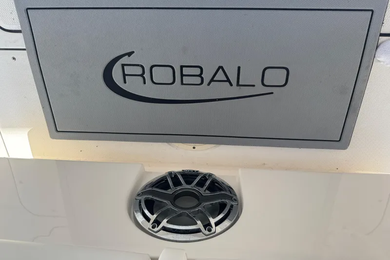 Slide: The Image of 2023 Robalo R302 Center Console boat speaker and logo detail. - 29