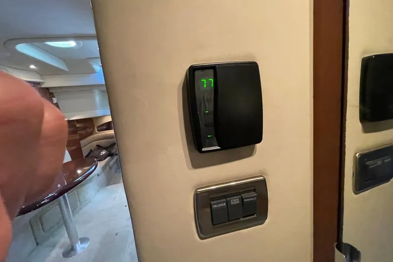 Slide: The Image of Interior of 2006 Sea Ray 360 Sundancer with thermostat and control panel. - 39