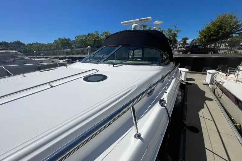 Slide: The Image of 2006 Sea Ray 360 Sundancer yacht docked at marina, front view. - 50