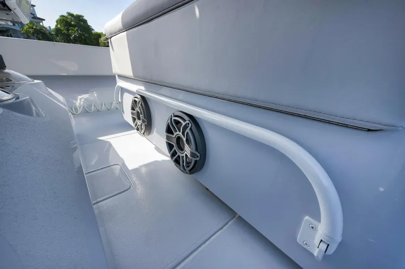 Slide: The Image of 2025 Contender 44 ST boat interior with speakers and seating. - 28