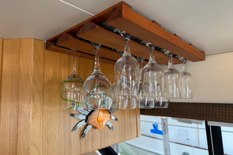 Slide: The Image of Interior of 1999 Bayliner 3988 Command Bridge Motoryacht with kitchen and seating area. - 15