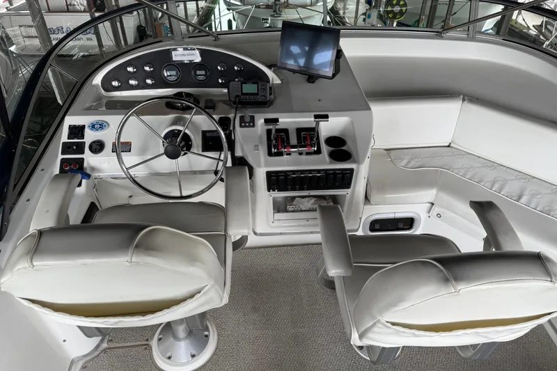 Slide: The Image of Bathroom in 1999 Bayliner 3988 Command Bridge Motoryacht with green accents and stainless steel sink. - 59