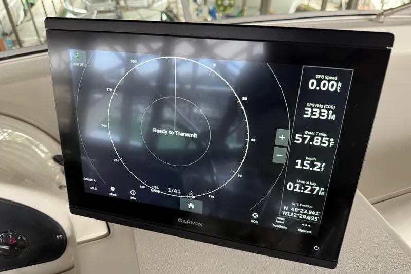 Slide: The Image of 1999 Bayliner 3988 Command Bridge Motoryacht helm with dual seats and navigation controls. - 62