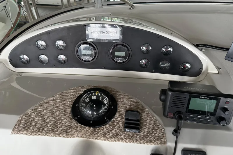 Slide: The Image of Garmin navigation display on 1999 Bayliner 3988 Command Bridge Motoryacht showing map and coordinates. - 64