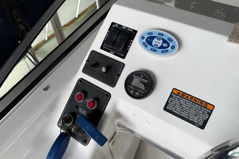 Slide: The Image of Garmin sonar display on 1999 Bayliner 3988 Command Bridge Motoryacht showing depth and temperature. - 66