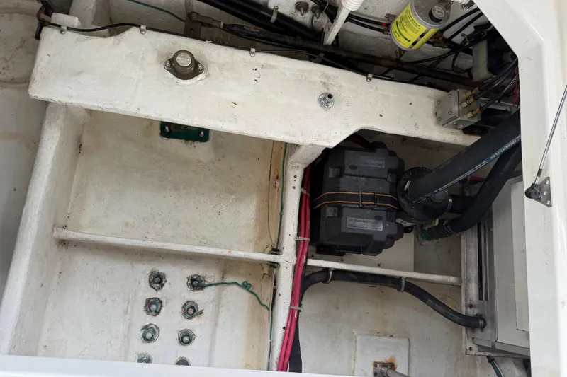 Slide: The Image of 1999 Bayliner 3988 Command Bridge Motoryacht control panel with switches and warning label. - 69