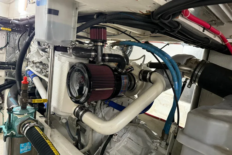 Slide: The Image of 1999 Bayliner 3988 Command Bridge Motoryacht interior with ladder and seating area. - 73