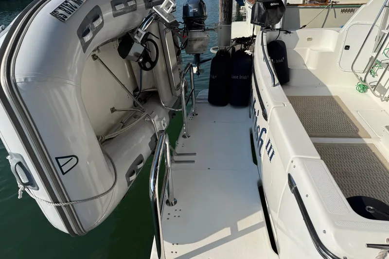 Slide: The Image of Engine compartment of 1999 Bayliner 3988 Command Bridge Motoryacht, showing mechanical components. - 79