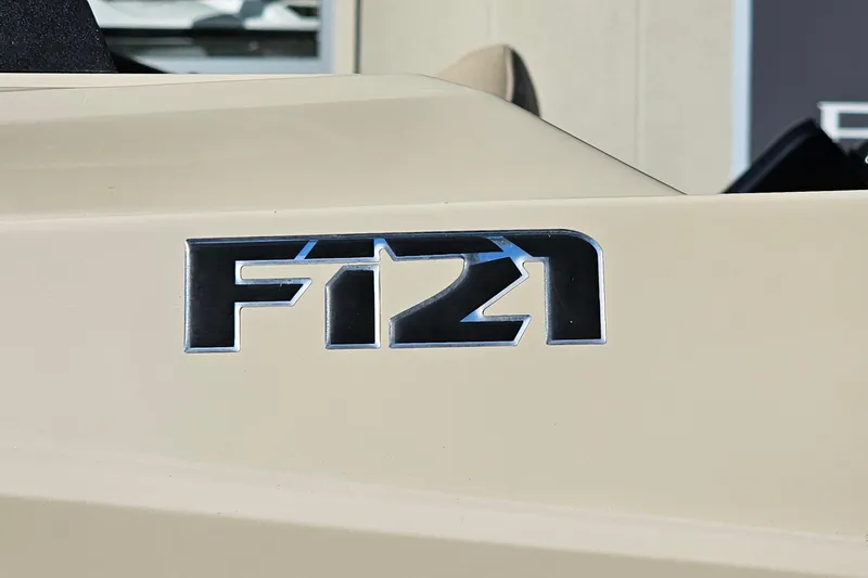 Slide: The Image of 2021 Centurion Fi21 logo on beige surface, close-up view. - 24