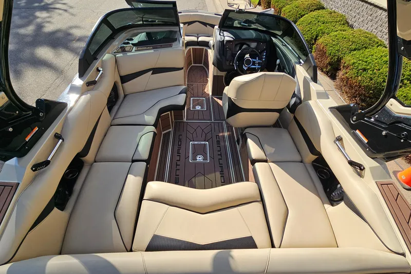 Slide: The Image of Luxurious interior of 2021 Centurion Fi21 boat with beige seating and sleek design. - 7