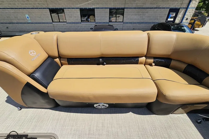 Slide: The Image of Luxurious tan seating on 2021 Regency 230 LE3 boat, featuring elegant design and comfort. - 103