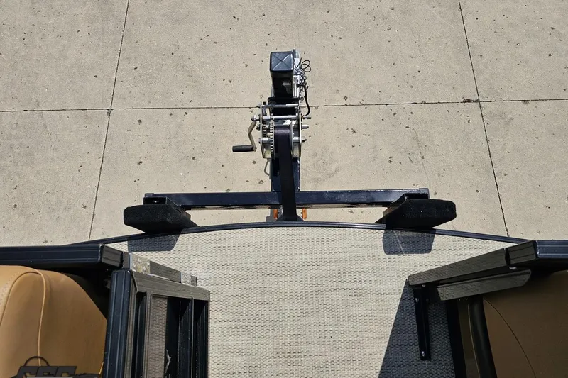 Slide: The Image of Top view of 2021 Regency 230 LE3 boat trailer hitch on concrete surface. - 111