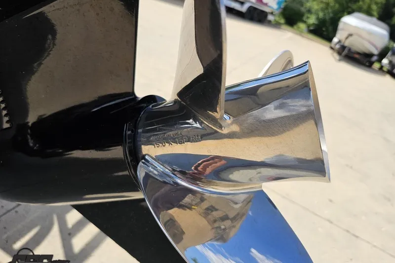 Slide: The Image of Close-up of a shiny boat propeller on a 2021 Regency 230 LE3. - 48