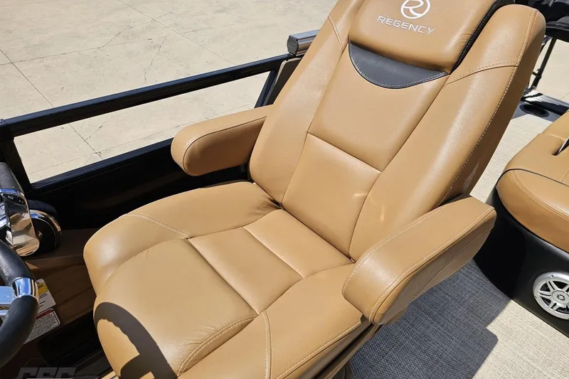 Slide: The Image of Luxurious tan leather seat in 2021 Regency 230 LE3 boat. - 78