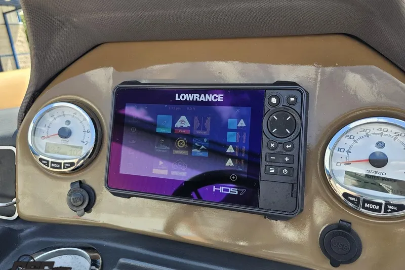 Slide: The Image of Dashboard of 2021 Regency 230 LE3 with Lowrance HDS7 display and gauges. - 86