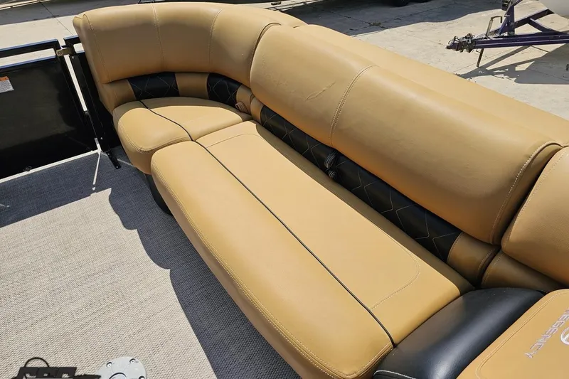 Slide: The Image of Luxurious tan seating on 2021 Regency 230 LE3 pontoon boat. - 93