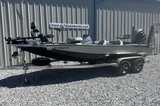 Slide: The Image of 2022 Xpress X19 Pro fishing boat on trailer, parked outside Andalusia Marine. - 1