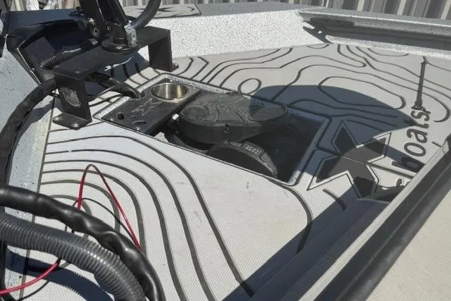 Slide: The Image of 2022 Xpress X19 Pro boat deck with intricate design and mounted equipment. - 3