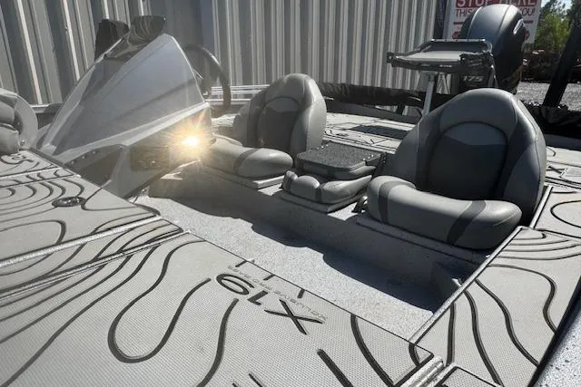 Slide: The Image of 2022 Xpress X19 Pro boat interior with dual seats and modern design. - 5