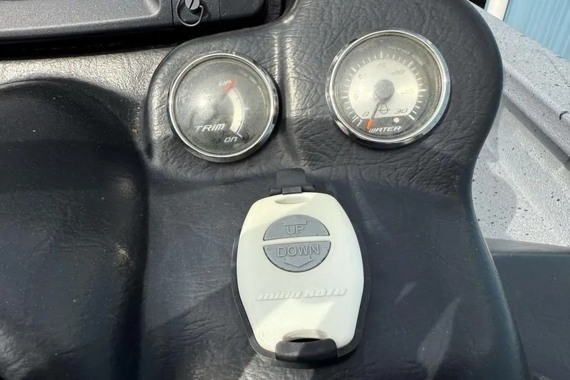 Slide: The Image of Dashboard of 2016 Xpress XCLUSIVE SERIES X21 with trim and water gauges. - 10